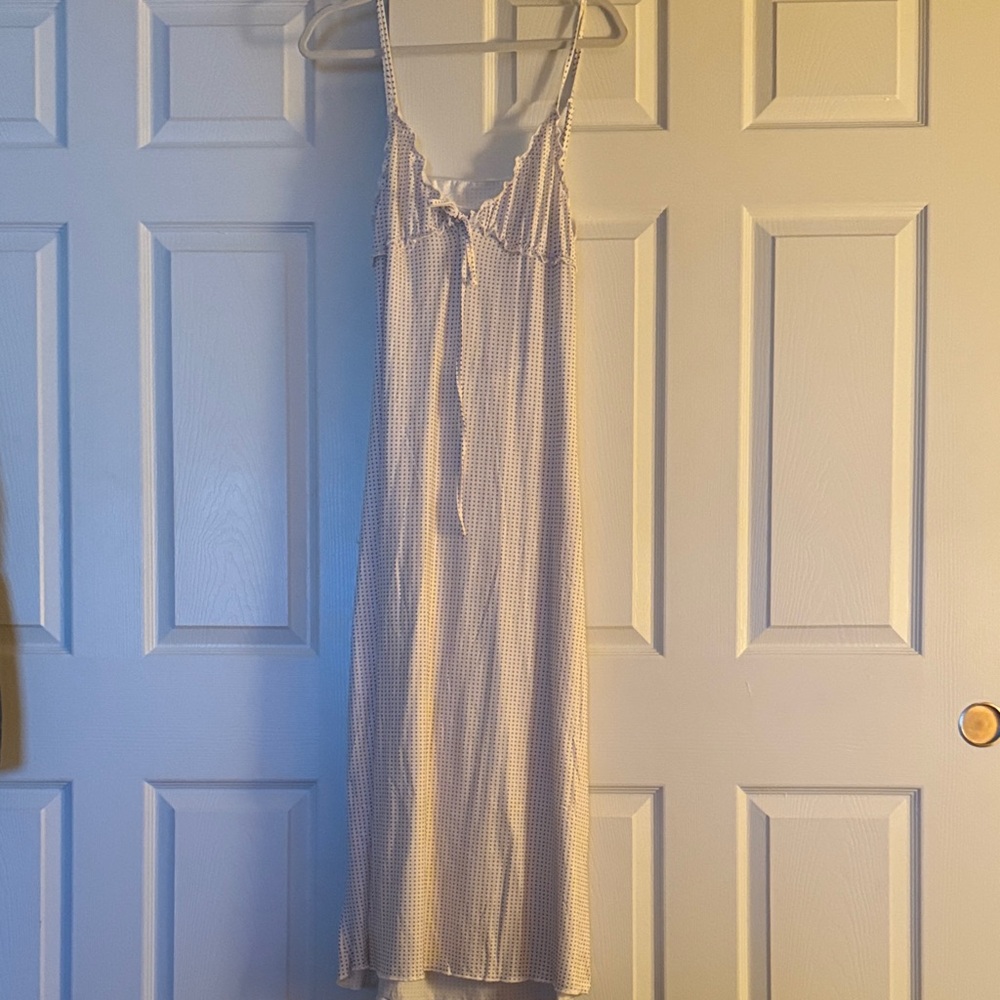 White dress with black Polka dots and open back